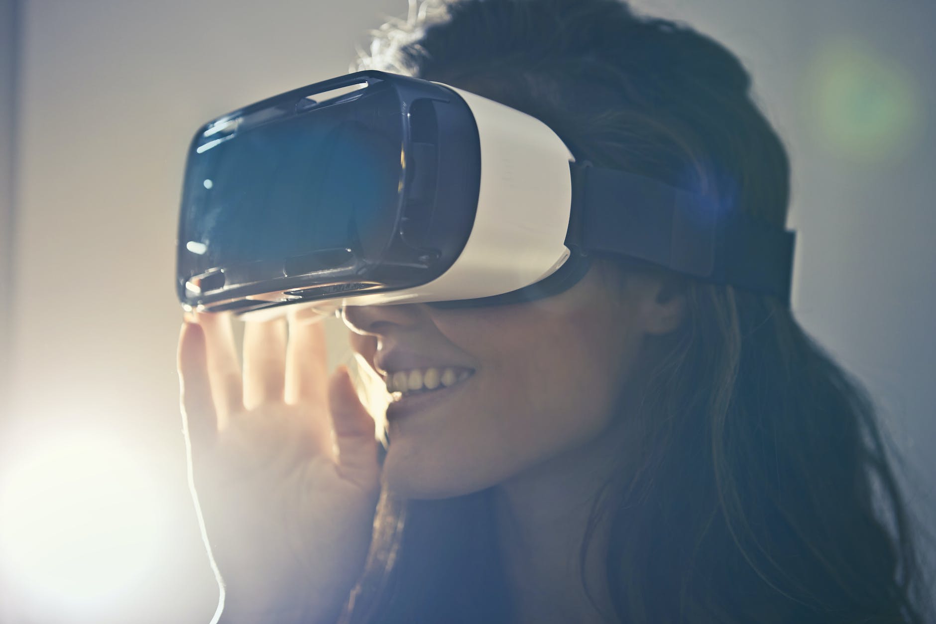 man wearing white virtual reality goggles